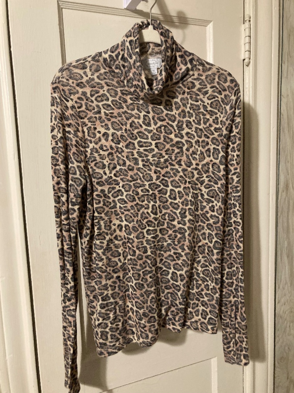 Leopard print turtleneck